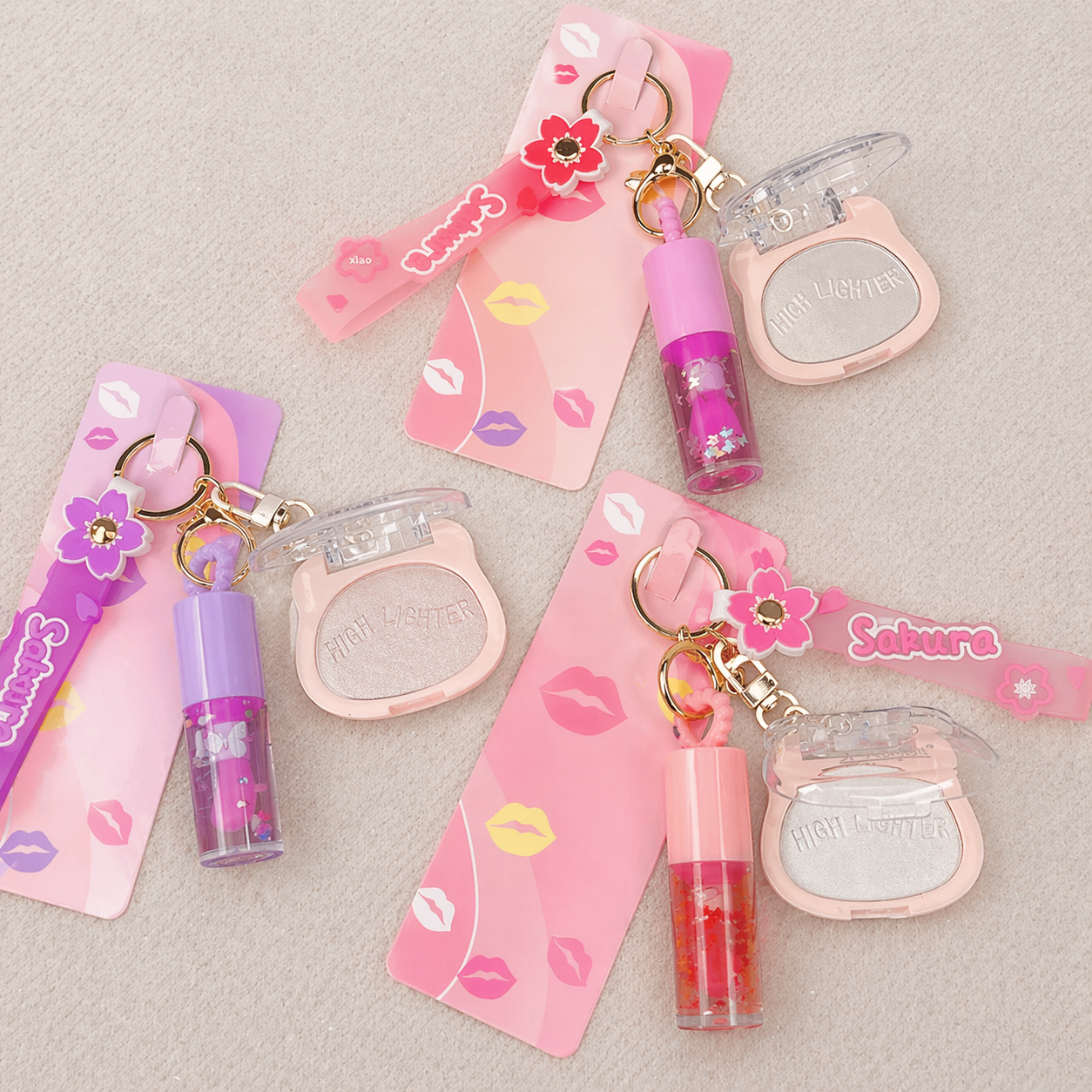 Sakura Lip Gloss & Mini Highlighter or Blusher Keychain -   جلوس شفاه مع تعليقة وميني هايلايتر او بلاشر