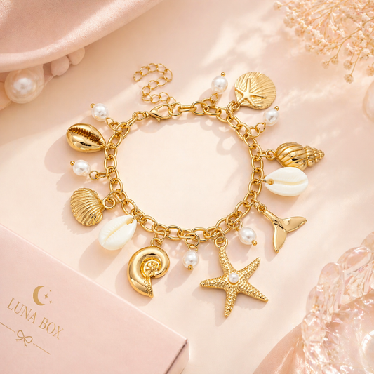 Golden Ocean Pearl Charm Bracelet - سوار اللؤلؤ البحري الذهبي